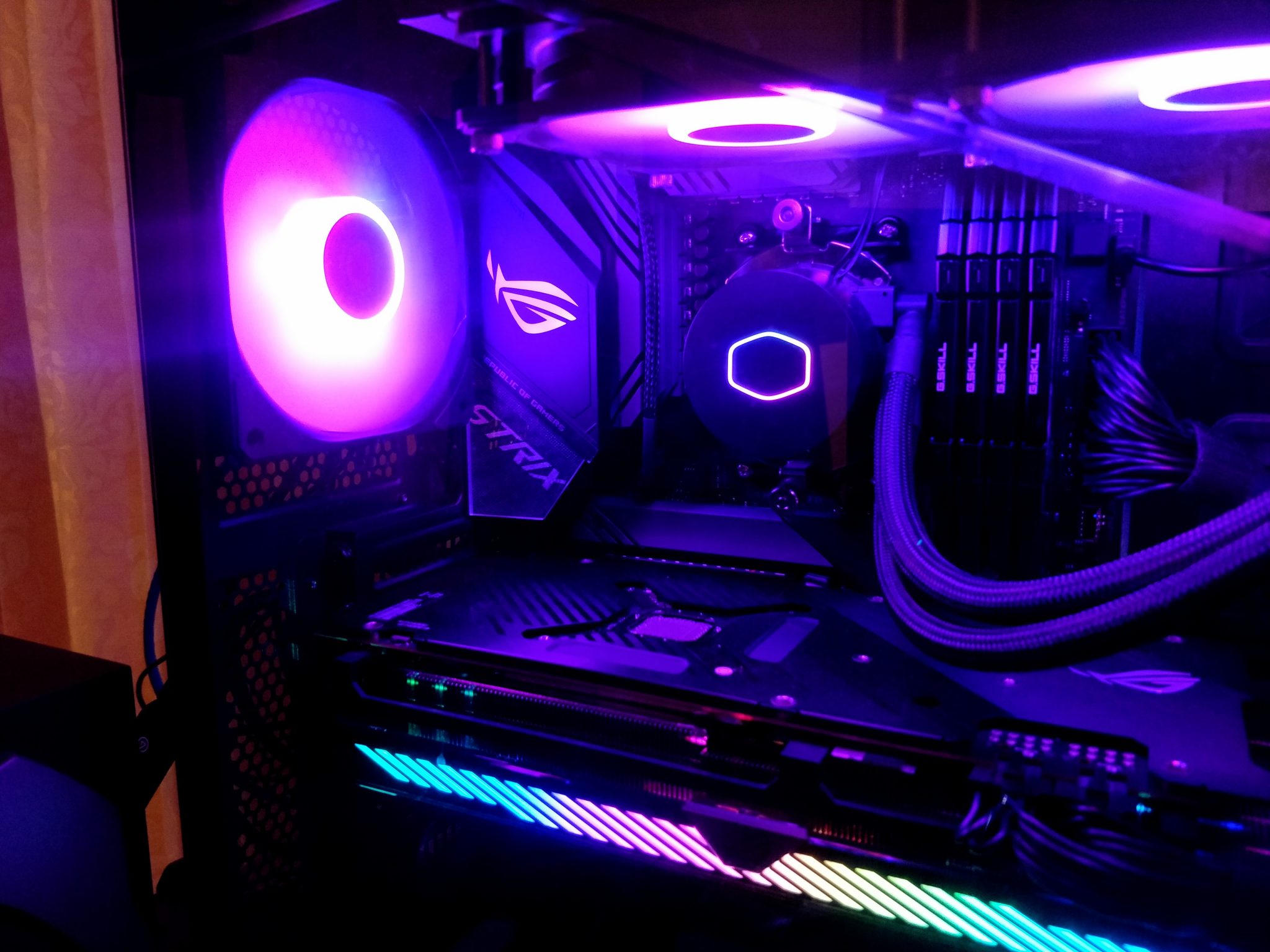 Inside view of a gaming PC with lighting and components