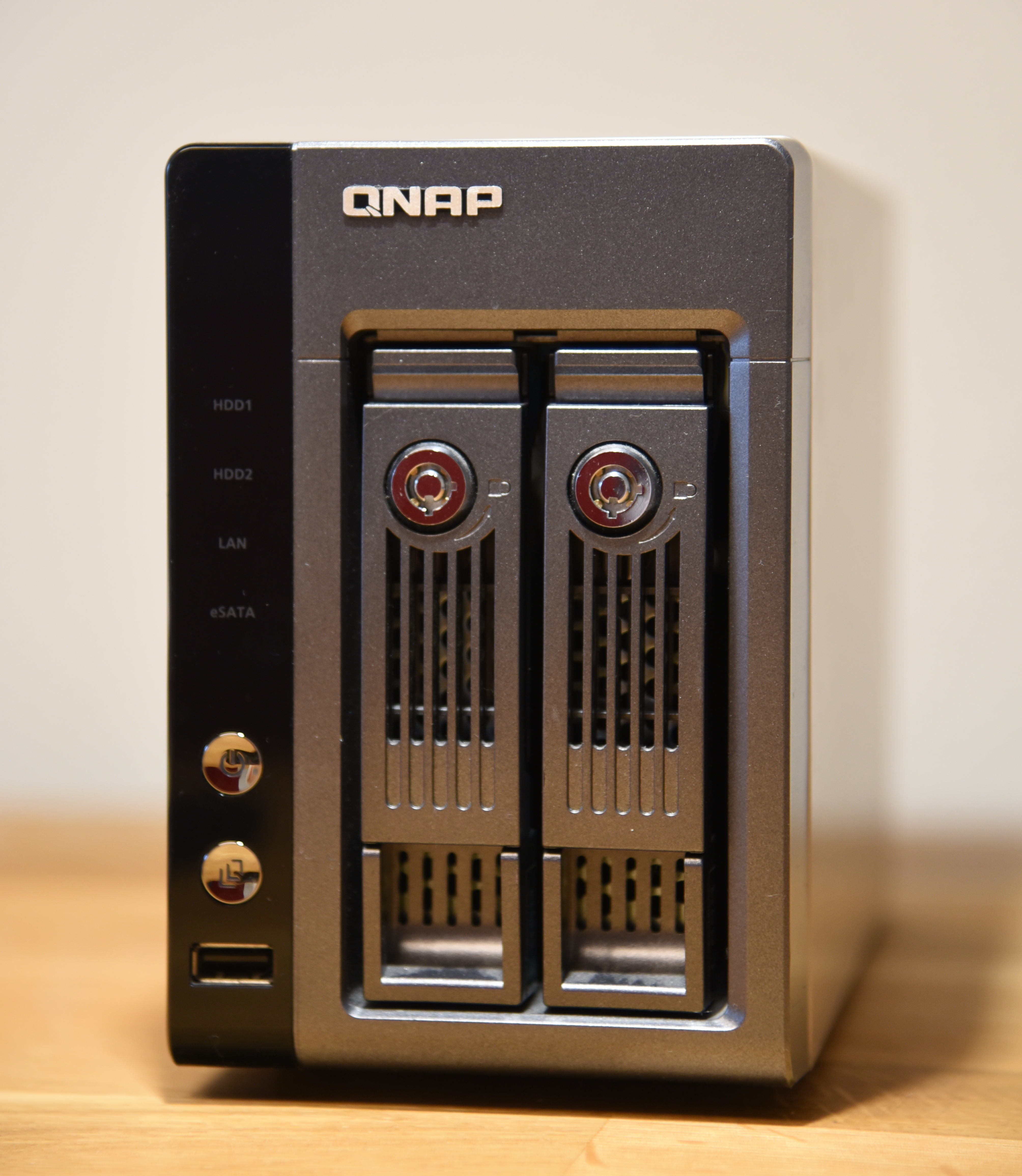 Front-facing QNAP network attached storage enclosure