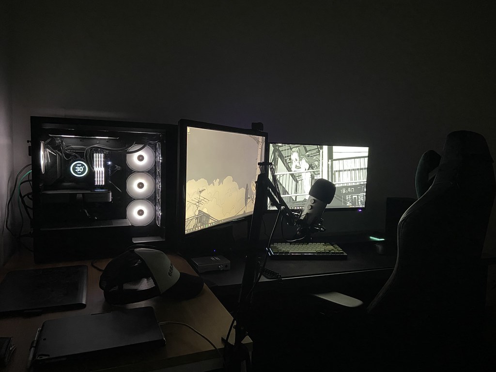 A gaming setup with a monitor and controller, representing gameplay streaming from home.